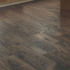 an image of wood flooring that looks like it has been installed in the kitchen