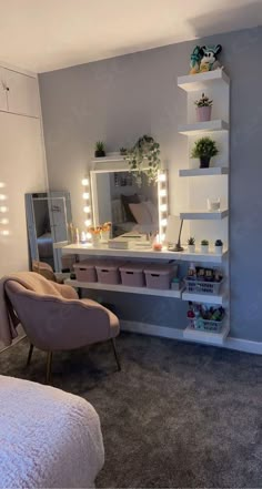 a bedroom with a chair, mirror and lights on the wall in front of it