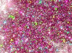 pink and green glitter is in the air