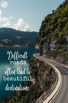 an image of a road going down the side of a mountain with a quote about difficult roads often lead to beautiful destinations