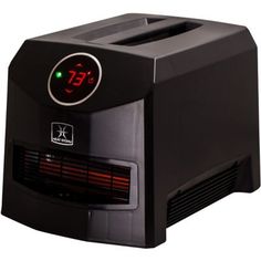 a black counter top heater with thermometer on it's display screen