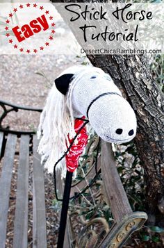 a stuffed horse sitting on top of a wooden bench next to a tree with the words easy