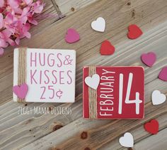 valentine's day sign and calendar displayed on wooden planks