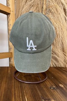 Do you want to look great at the Dodger game? Our Let's Go Dodgers Hat is perfect for you! It's a classic baseball cap with an adjustable back so you can find the perfect fit. Plus, it comes in so many different colors that you'll have no problem finding your favorite. Let's go Dodgers! Let's Go Dodgers, Dodgers Hat, Dodger Hats, Dodger Game, Store Hours, No Problem, Shoe Box, Baseball Cap, Black Silver