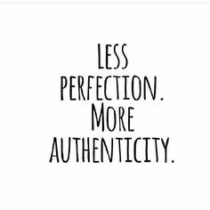 the words less perfection more authenticity are written in black ink