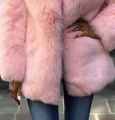 STUNNING PINK BABY ALPACA FUR COAT Styled and glamorous Baby Alpaca fur coat handmade by Peruvian artisans, handmade of 100% baby alpaca fur. Value for money is what every buyer seeks to achieve when buying any item. In the recent past, fur coats have gained popularity, and everyone wants to have as many of these as they can afford. Indeed, the coats are luxurious and investment because of many reasons. Size available : S - M - L - XL - XXL Material: 100% baby Alpaca fur. Garment Type: fur coat Spring Fluffy Faux Fur Coat, Chic Fluffy Fur Coat, Chic Fluffy Fur Coat For Spring, Winter Pink Fluffy Fur Coat, Solid Color Faux Fur Coat For Winter, Winter Faux Fur Coat With Feather Trim, Pink Winter Outerwear With Feather Trim, Pink Faux Fur Outerwear With Fur Trim, Pink Fluffy Long Sleeve Fur Coat