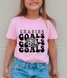 Welcome and thank you for choosing KayReneeDesign my online Etsy store for custom designs, gifts, and apparel💐 Cute trendy custom soccer t-shirt for girls soccer team. Whether for your daughter, niece, sister or cousin this would make a great t-shirt to represent the soccer player in and out of the game! Feel free to message me with any questions you may have. If you are ordering 5 or more at a time be sure to message me before you checkout for a discount code.  HOW TO ORDER:  Select size and c Girls Soccer Team, Soccer Event, Soccer Outfit, Soccer Tees, Soccer T Shirt, Soccer Memes, Female Soccer Players, Soccer Tips, Soccer Party