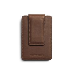 Our sturdy and reliable Magnetic Money Clip Wallet, designed to last years of use and built from our signature Navigator leather. Includes two leather-lined credit card slots and a leather-wrapped magnetic clip. Monogramming available for a personal touch. | Shinola Men's Magnetic Money Clip Card Wallet Classic Brown Card Holder With Coin Pocket, Classic Leather Card Holder With Coin Pocket, Classic Brown Trifold Card Holder, Classic Brown Card Holder With Rfid Blocking, Classic Rectangular Wallets With Interior Card Slots, Classic Rectangular Wallet With Interior Card Slots, Classic Bifold Card Holder For Everyday Use, Classic Brown Trifold Wallet For Business, Classic Card Holder With Coin Pocket