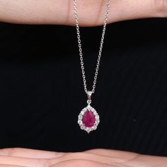 "Solid Gold Handmade Necklace, Ruby Diamond Solid Gold Necklace, Minimal Gold Necklaces, Give Your Gift, Pear Ruby Diamond Necklace, Only You   Items Details * Made to Order * Gold KT: 14K or 18K * Custom Gold Color: Rose Gold, Yellow Gold, White Gold. * Ruby: 0.80ct * Round CTW: 0.25ctw * Diamond Color-Clarity: E Color VS Clarity If you have any additional questions about this necklaces, just hit the \"Message \" button and we will get back to you within a few hours. ★ ★ ★ Each order will be be Fine Jewelry Ruby Diamond Necklace Brilliant Cut, White Gold Ruby Necklaces With Brilliant Cut, White Gold Ruby Necklace With Diamond Cut, White Gold Ruby Necklace With Brilliant Cut, Diamond Drop Necklace With Gemstone, Teardrop Diamond Gemstone Necklace, Exquisite White Gold Bridal Necklace With Gemstones, Fine Jewelry Ruby Necklace In Diamond White, Fine Jewelry Diamond Pear-shaped Bridal Necklace