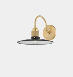 the brass and black wall light with an adjustable arm