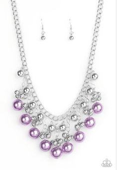 Infused with silver beads, oversized purple pearls swing from the bottoms of beaded silver tassels, creating an elegant fringe below the collar. Features an adjustable clasp closure. Sold as one individual necklace. Includes one pair of matching earrings. Bedazzled Jewelry, Paparazzi Accessories Jewelry, Silver Strand, Color Violeta, Pearl Necklace Earrings, Purple Necklace, Silver Bead Necklace, Purple Pearl, Blue Gems