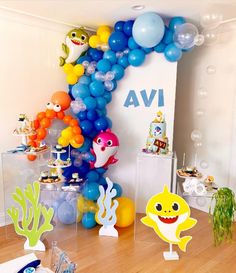 an under the sea birthday party with balloons and decorations