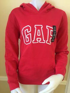 Soft, comfy fleece. Hood with drawcord ties. Embroidered arch logo applique at front. Kanga pockets. APRX ARMPIT TO ARMPIT MEASUREMENT 2XL:25” Hot Pink Sweatshirt, Hoodie Gap, Gap Sweatshirt, Gap Hoodie, Gap Logo, Crewneck Sweatshirt Women, Gap Jacket, Long Sleeve Blouse Pattern, Gap Women