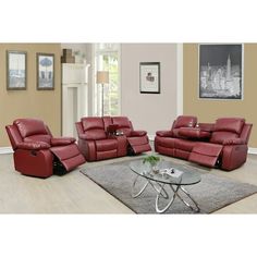 a living room with red leather furniture in it