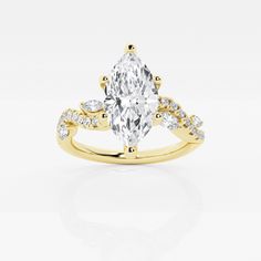 a yellow gold engagement ring with an oval cut diamond surrounded by small white diamonds on the band