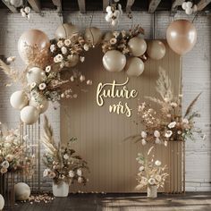 the entrance to a wedding with balloons and flowers