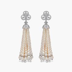 Descending from a club-inspired diamond motif, these 18K white gold earrings showcase a cascade of Freshwater pearls, elegantly graduating into a refined tassel. The Tassel earrings embody modern high-jewellery sophistication, with their intricate design and luxurious details, making them the perfect statement piece to elevate any ensemble. Pearl Size: Mixed Metal: 18K White GoldApproximate Diamond Weight: 2.79cts Club Earrings, Rare Pearls, High Jewellery, Pearl Jewellery, Yoko London, White Gold Earrings, Pearl Types, Earring Crafts, Pearl Diamond