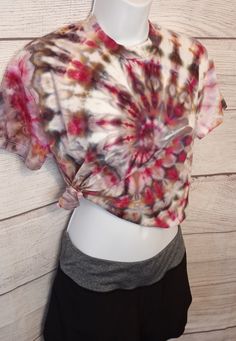 Cropped Tie-dye Tee. Juniors/ woman's size medium. Ice tie-dye technique with a spiral design. Multiple color splits of maroon red, pink, grey/ green tones. Cute cropped tee, that can be worn dressed up with a jacket or casual workout, lounge/ sleepwear. Wide oversized/ loose fit.  Looks great with a side tie. See photos for manufacturer measurements and description. Tie Dye Short Sleeve Crop Top For Summer, Spring Tie Dye Cropped Crop Top, Casual Tie Dye Crop Top For Spring, Spring Tie Dye Short Sleeve Crop Top, Spring Tie-dye Short Sleeve Crop Top, Summer Acid Wash Crew Neck Crop Top, Summer Acid Wash Crop Top With Crew Neck, Acid Wash Crew Neck Crop Top For Summer, Acid Wash Cropped T-shirt For Spring