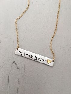 Hello Mama! This piece is for you, keep your babies close mom of 2. Lol, okay that's corny but seriously how gorgeous is our Double Name Bar?  We love this layered with longer necklaces! The Double Name Bar Necklace features a (.999) fine silver bar custom inscribed with two names, words, dates, initials or whatever your little heart desires. Accented with a gold heart, hammered edges and a brushed matte finish. Baguette Diamond Necklace, Initial Rings, Double Name, Floating Diamond Necklace, Sideways Initial Necklace, Mom Of 2, Dainty Diamond Necklace, Crescent Necklace, Floating Necklace