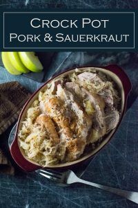 crock pot pork and sauerkraut in a casserole dish with bananas on the side