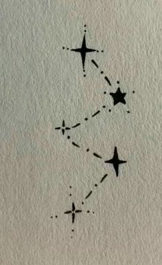 two stars are drawn on the wall with black ink