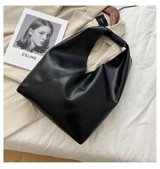 SPECIFICATIONSVintage Bag: New In 2021Types of bags: Shoulder HandbagsThe Season: SS21Temperament: Office to work ladyStyle: Casual Lady Fashion National VintageStyle: CasualShape: Casual TotePlace Of Origin: GUANG DONG ProvincePattern Type: SolidOrigin: CN(Origin)Occasion: VersatileNumber of Handles/Straps: SingleModel Number: Y1Main Material: PULining Material: Synthetic LeatherItem Type: HandbagsInterior: Cell Phone PocketHigh Quality Leather: Large-Capacity BagsHardness: SoftHandbags Type: S Minimalist Tote Bag, Minimalist Tote, Handbags Large, Leather Tote Bag Women, Leather Totes, Denim Tote Bags, Leather Handbags Tote, Big Bags, Leather Hobo Bag