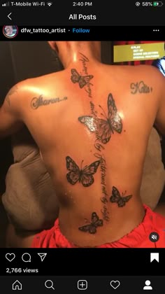 the back of a woman's body with butterflies on it