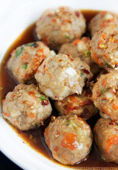 meatballs with sauce in a white bowl