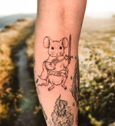 Adventuring anthropomorphic little creatures are about to become my new brand y’all because I am obsessed with doing them!! I had so much fun creating this wee hobbit esque mouse for a wonderful client on my recent guest spot, thank you so much again!! #tattoo #fantasytattoo #lotrtattoo #cutetattoo #cottagecore #mousetattoo #fineline #blackwork Grover Tattoo, Hilda Tattoo, Brambly Hedge Tattoo, Rat Mushroom Tattoo, Mouse And Mushroom Tattoo, Fairy Rats Tattoo, Mouse Tattoo, Cottagecore Tattoo