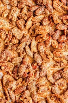 close up view of nuts that have been roasted and are ready to be eaten in the oven