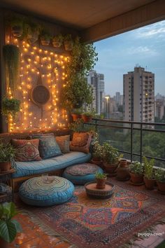 a balcony decorated with potted plants, lights and rugs on the outside patio