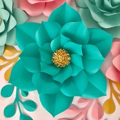 the paper flowers are all different colors