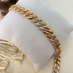 ✨ Elegant Gold Plated Cuban Link Chain Bracelet with Sparkling Rhinestones ✨ Add a touch of luxury and sparkle to your outfit with our stunning Gold Plated Cuban Link Chain Bracelet! Perfect for any occasion, this high-quality bracelet is designed to make you shine. Whether you're dressing up for a night out or adding a bit of glam to your everyday look, this bracelet is your go-to accessory! 💖 🌟 Features: *Gold Plated: High-quality gold plating for a luxurious finish *Cuban Link Chain: Classi Elegant Gold Chain Bracelet With Rhinestones, Gold Crystal Chain Bracelet With Sparkling Stones, Gold Crystal Chain Bracelet With Bling, Elegant Cuban Link Bracelet With Cubic Zirconia, Gold Crystal Chain Bracelets, Gold Crystal Bracelets With Diamond Accents, Gold Crystal Bracelets With Chain Detail, Gold Crystal Bracelet With Chain Detail, Gold Chain Bracelet With Crystal Accents