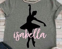 a t - shirt that says,'usaella'with a ballerina silhouette on it