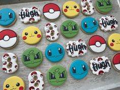 some decorated cookies are sitting on a table