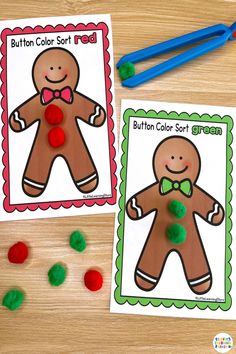 two gingerbread cut outs with buttons on them next to scissors and gummy balls