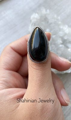 Silver ring with natural black obsidian for women! This ring is a perfect gift idea to the one who loves natural black color of stone and minimalist style) The ring size is adjustable, so you can give a gift without knowing the size! But if you want we can make any size of this ring! Also, we can make matching earrings, pendants, and bracelets! Just message me) Choosing Shahinian Jewelry, you choose the unique design, the best quality, and the perfect look! Ring weight: 10,5 gr ✍️If you have any Handmade Black Crystal Ring In Sterling Silver, Black Sterling Silver Crystal Ring, Handmade Black Crystal Open Ring, Handmade Black Open Crystal Ring, Black Teardrop Rings For Gift, Black Teardrop Ring For Gift, Black Rings With Natural Stones For Gift, Black Obsidian Gemstone Ring, Black Teardrop Natural Stone Jewelry