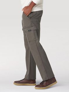 Do anything, go anywhere in total comfort. This Wrangler Authentics® relaxed fit stretch cargo pant is built to help you take on busy days or kick back on easy days. It's made of a comfortable cotton blend that's easy to wear all year long and features a small bit of stretch for flexibility. It also comes with six pockets total, including two cargo pockets, two back patch pockets, and two hand pockets. From working around the yard to making memories with the family, you can't go wrong with a cla Relaxed Fit Straight Leg Cargo Jeans With Functional Pockets, Relaxed Fit Straight Leg Cargo Jeans For Outdoor Activities, Casual Relaxed Fit Cargo Pants For Outdoor Work, Tactical Cotton Cargo Jeans With Pockets, Military Pants With Cargo Pockets For Outdoor Work, Outdoor Cargo Pants With 4-way Stretch, Wrangler Pants, Men's Retro Style, Outdoor Pants With 4-way Stretch And Pockets