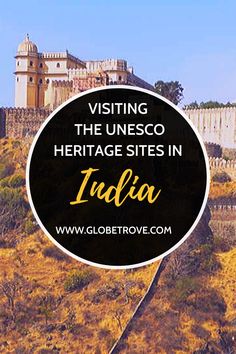 a sign that says visiting the unescoo heritage sites in india on top of a hill