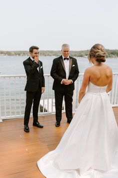 the bride and groom are getting ready to walk down the aisle