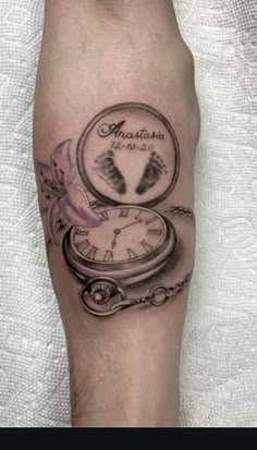 a person with a clock tattoo on their leg