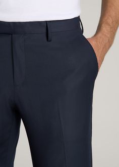 About Our Suit Trousers for Tall Men Crisp, classic and comfortable. That’s what you’ll find in these suit trousers for tall men. Thoughtfully designed for men from 6’ to 7’1, these pants have an extended inseam for longer legs without the extra bagginess you usually find in a longer pant. They’re made with a slightly stretchy polyester blend and feature a comfortable cotton-blend lining. These men’s tall pants feature a tailored fit for a modern look that’s easy to wear from the office to the e Classic Business Suits With Long Pants, Classic Suits With Trousers And Pockets, Classic Trousers With Hidden Pockets, Classic Bottoms With Hidden Pockets And Straight Hem, Classic Tailored Pants With Hidden Pockets, Classic Business Casual Pants With Hidden Pockets, Classic Suiting Fabric Pants With Pockets, Classic Pants With Pockets In Suiting Fabric, Classic Suits With Welt Pockets And Tapered Leg