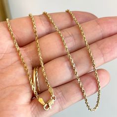 Estate 14KT yellow gold diamond-cut rope chain necklace. Length: 20" Solid chain 14KT Yellow Gold Lobster clasp Width: 2mm Unisex chain Stamped 14K Weight: 6.0 grams Some discoloration to the gold in a few spots as shown in the photos. Can be hard to notice as its a darker orange color. Yellow Gold Pendant Rope Chain Necklace, Yellow Gold Plated Jewelry With Rope Chain, Yellow Gold Rope Chain Necklace, 14k Yellow Gold Rope Chain Necklace, Luxury Gold-tone Rope Chain Jewelry, Rope Chain Necklace, Rope Chain, Diamond Cut, Necklace Length