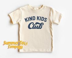 Kind Kids Club | T-Shirt | Unisex | Size Inclusive | Shirts for the Whole Family | Women's Shirt | Children's Shirt | Toddler Shirt Welcome to Summer Fox Co! We have the perfect gift for your family, friends, coworkers, and YOU!! We use super soft Bella Canvas tees that are our favorite! MADE TO ORDER just for YOU! Our tees are carefully hand-printed in-house in the United States. Thank you for allowing Summer Fox Company to help you find your NEW FAVORITE TEE.   Product Information -Soft and Hi Kids Shirt Svg, Neutral Shirt, T Shirt Svg, Back To School Svg, Retro Kids, School Tees, Club T Shirt, School Svg, Kids Club