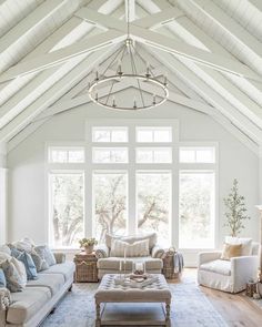 a living room filled with furniture and a fire place