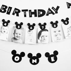 a birthday banner with mickey mouse heads on it