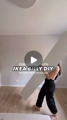 a person standing on top of a wooden floor in an empty room with the words ikea billy diy