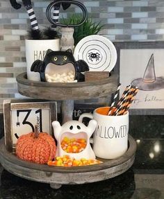 two tiered trays with halloween decorations on top of each other, and the words instagram above them