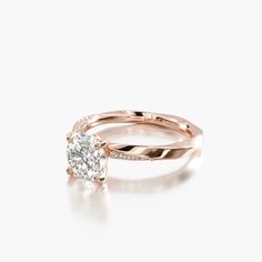 a rose gold engagement ring set with a round diamond