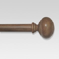 a close up of a wooden handle on a door